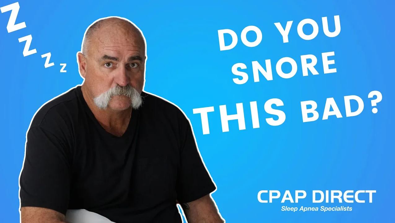 Load video: Short video clip of husband and wife in bed. Wife cannot sleep because her husband&#39;s snoring is too loud. She becomes very frustrated, and then Merv Hughes enters to tell them to see his mates at CPAP Direct to address his poor sleep quality.